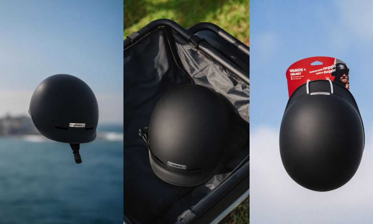 A matte black Vamos e-bike helmet featuring a minimalist low-profile design and a small branded label on the side