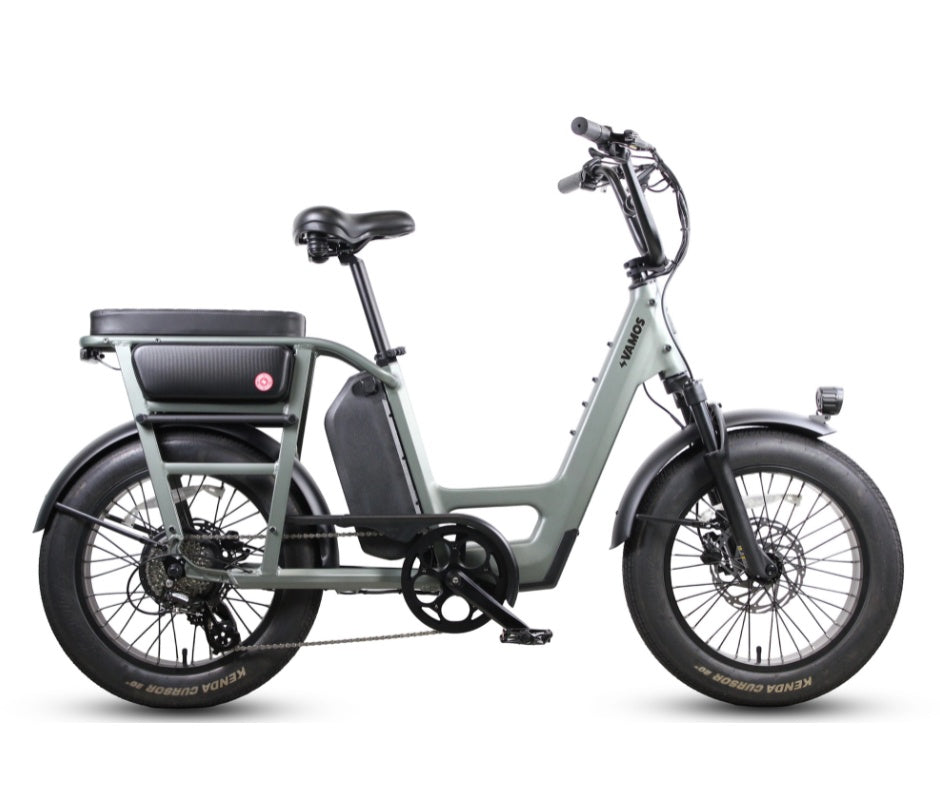 A grey Vamos Amigo 2026 All-Purpose Compact Cargo E-Bike featuring fat tires, a step-through frame, and a rear passenger setup.