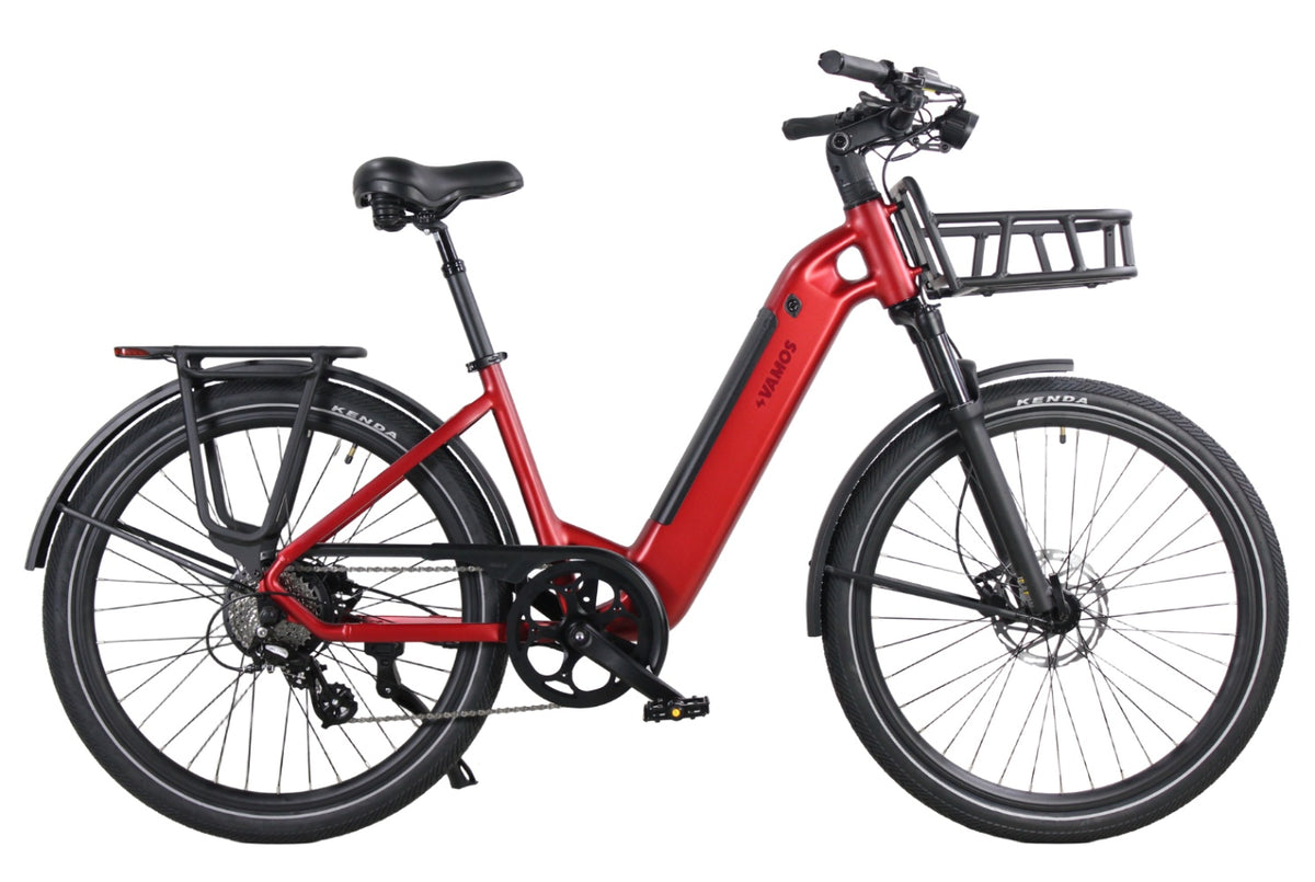 Side profile of the Vamos Rapido 2026 electric city commuter bike, featuring a matte frame and integrated rear rack.