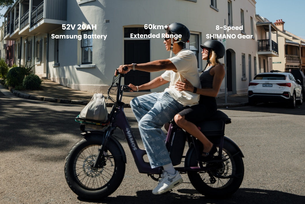 Vamos Amigo 2026 All-Purpose Compact Cargo E-Bike carrying two riders.