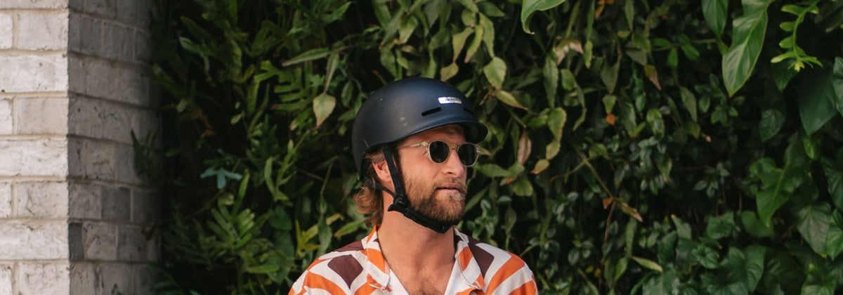 Promotional banner for the e-bike helmet collection, showcasing stylish and safety-certified headwear for riders.