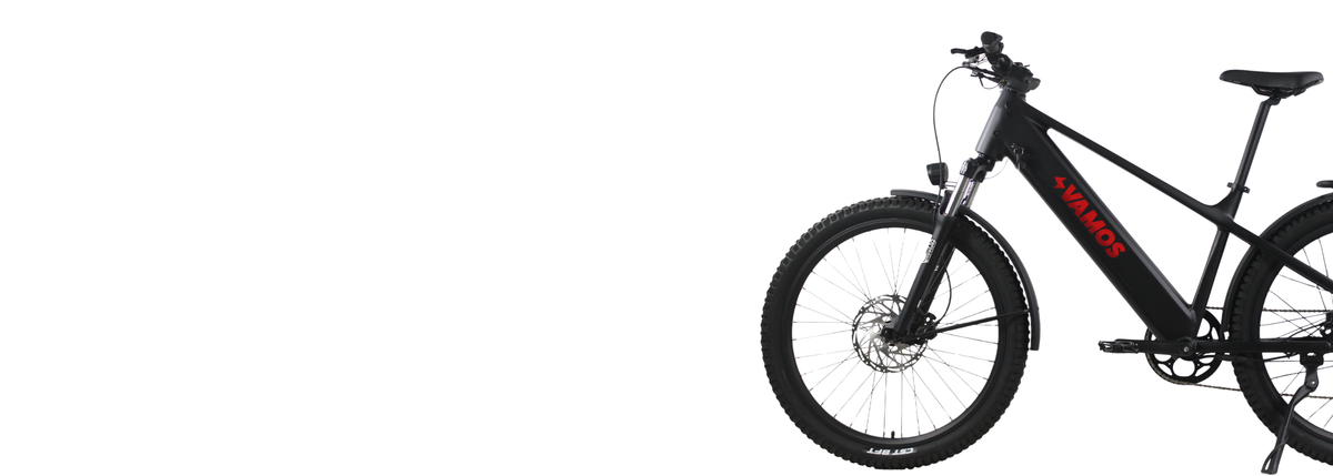 A high-performance Vamos El Diablo mountain e-bike in matte black, featuring a front suspension fork, integrated downtube battery, and rugged off-road tyres against a clean white background.