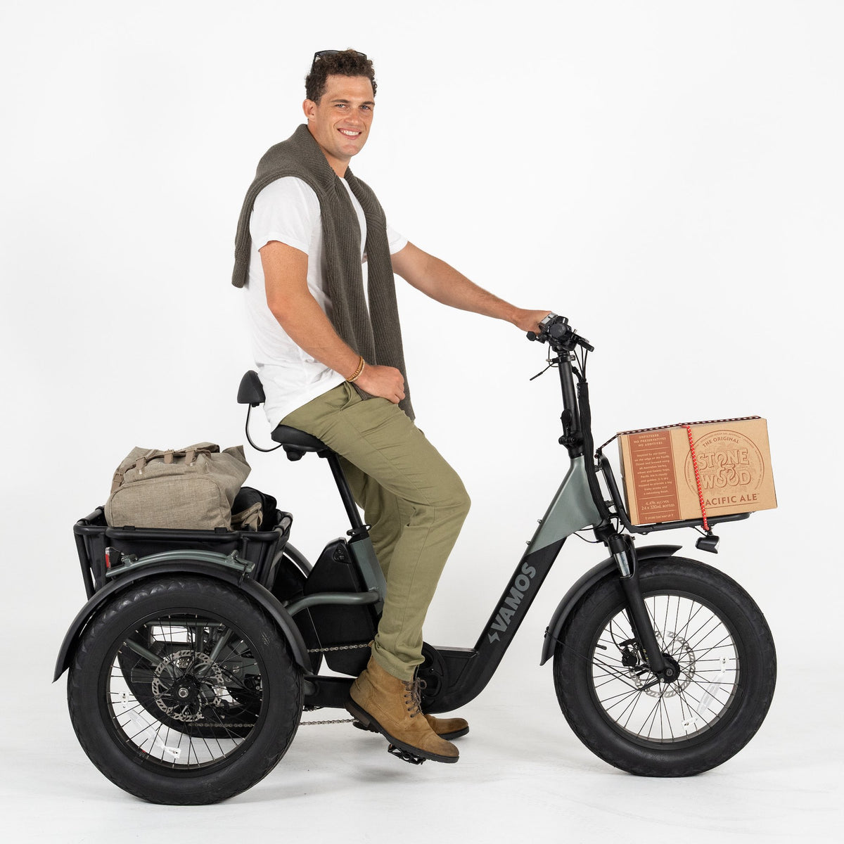 A man in 6”5 / 196cm size riding a Vamos El Papa Grande Pro Ebike