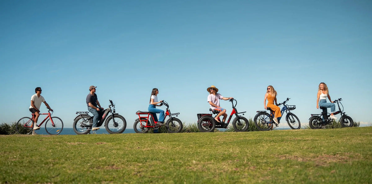 A group of friends riding every model of Vamos Electric Bikes