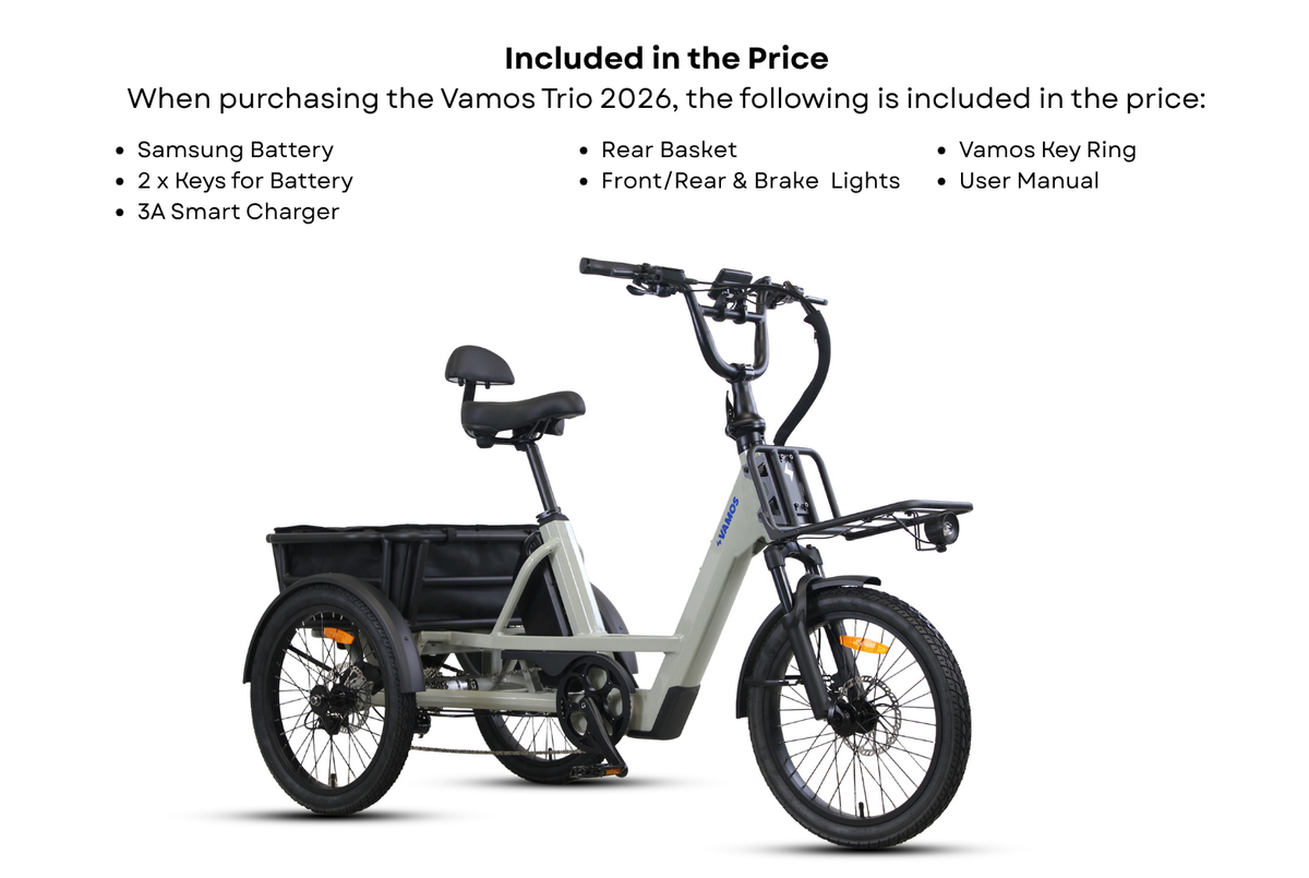 Vamos Trio 2026, a grey Vamos Trio 3 Wheel Electric Trike with a large rear cargo basket, front rack, and integrated headlights.