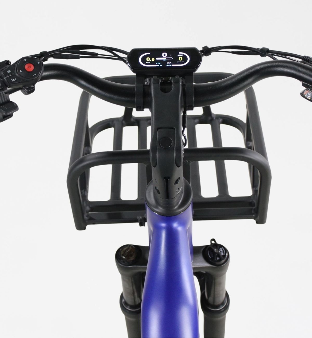 Studio shot showing the digital display screen, handlebars, and front cargo basket of a blue-purple Vamos electric bike.